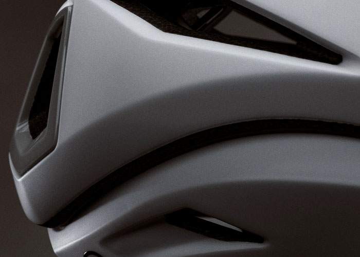 Giro Eclipse Pro extended polycarbonate shell coverage protecting EPS foam at high-impact zones