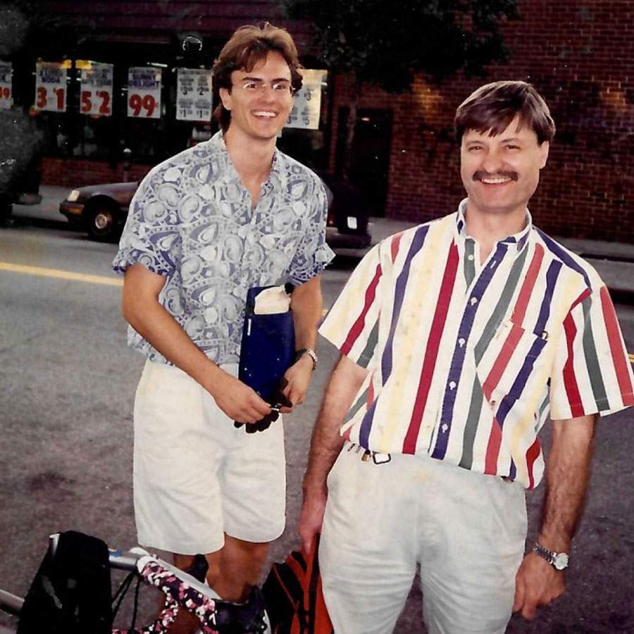 Philip Cabbad standing with a colleague outside the Brooklyn shop in the early 1990s, a road bike visible between them